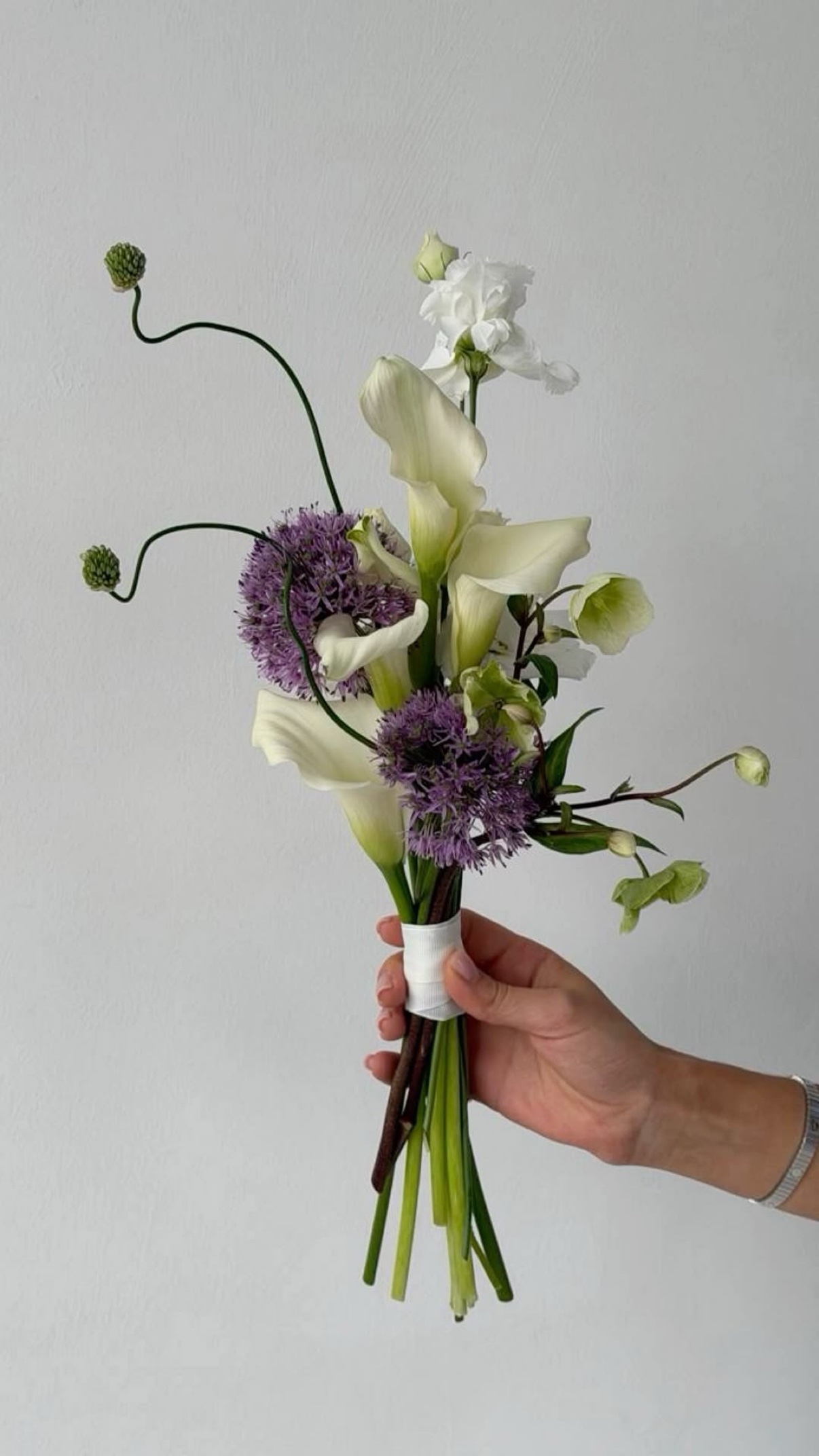 Modern white calla lily and purple allium bridal bouquet